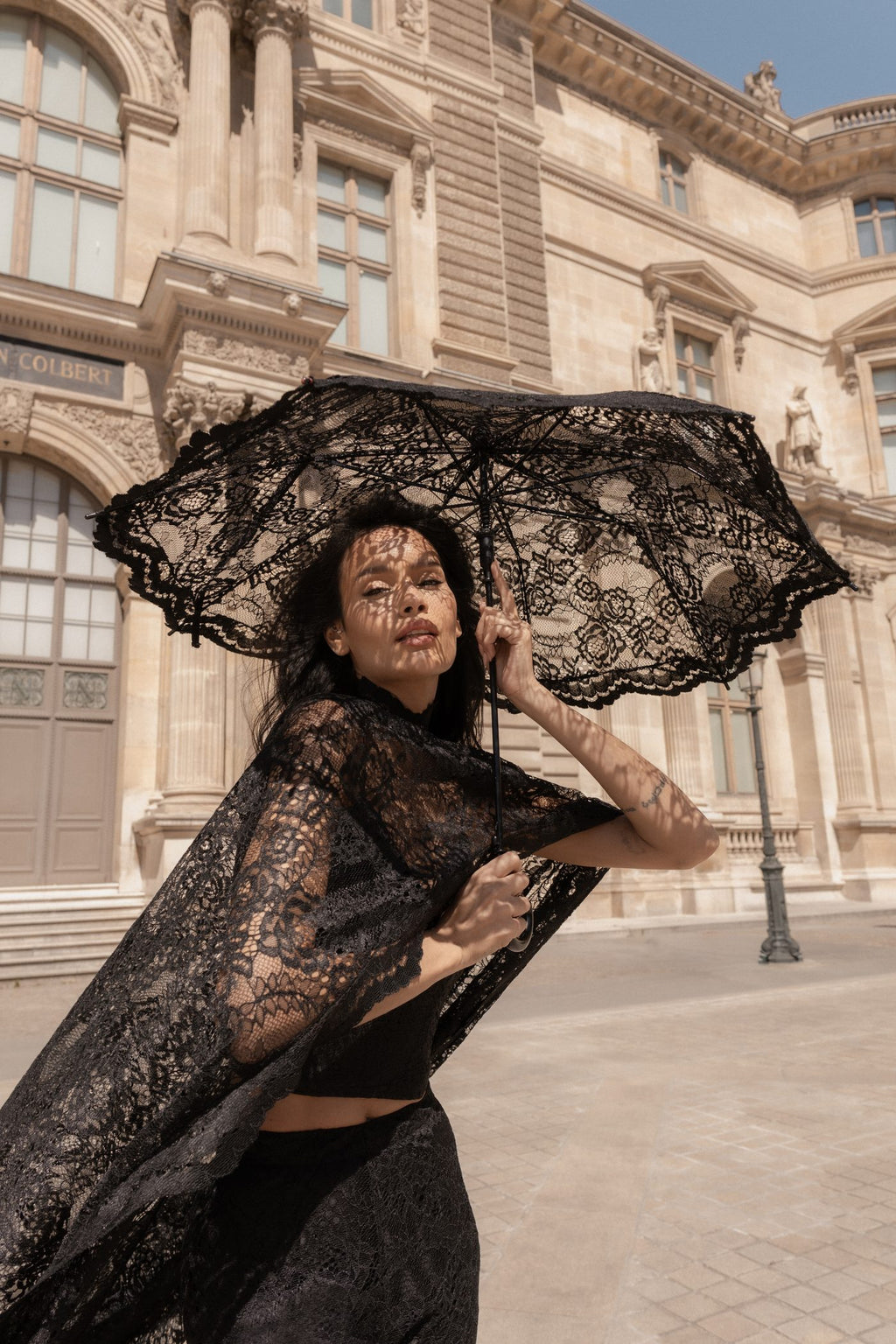 Close-up of the black French Chantilly lace on the Femme Cape.
