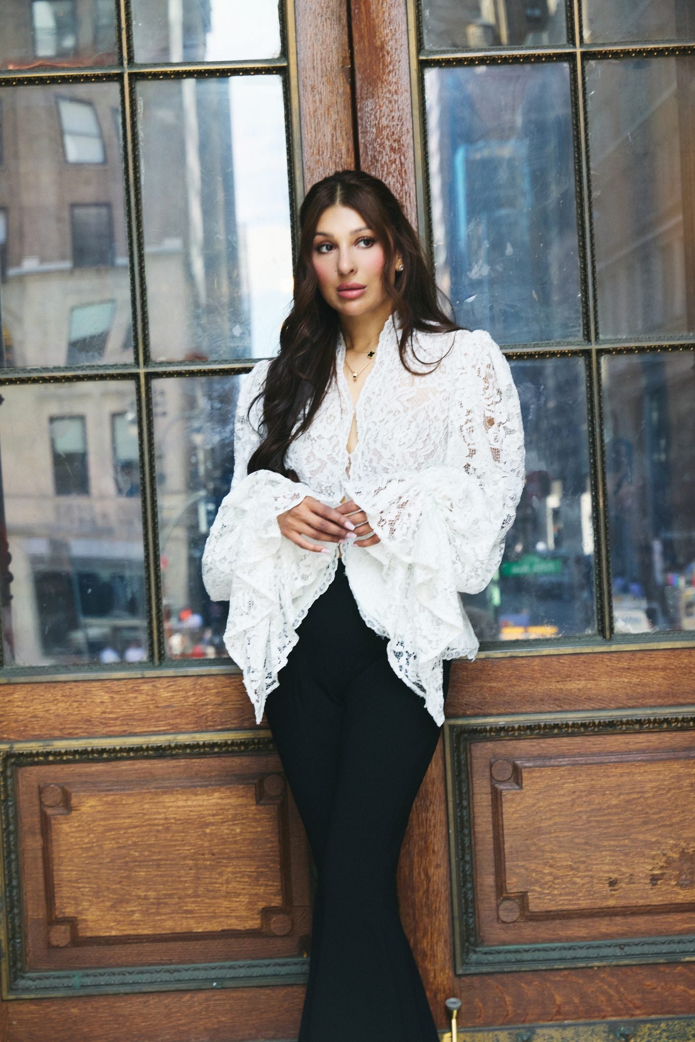 Mohy Ali-Fehmy, founder of La Fehm, in a white lace jacket in New York